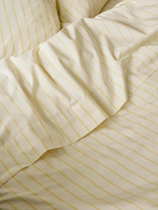 Close up Butter Yellow Slumber Stripe Flat Sheet
