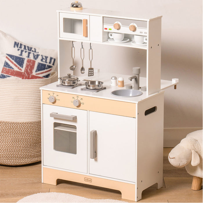 ROBUD white wooden play kitchen with chalkboard panel, upper hutch, microwave and silver accessories.