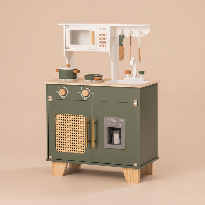 ROBUD green wooden kitchen unit with rattan door panel, white countertop and gold ice dispenser.