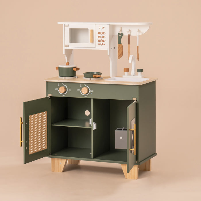 ROBUD green kitchen toy unit with open lower cabinet doors revealing interior shelves and storage.