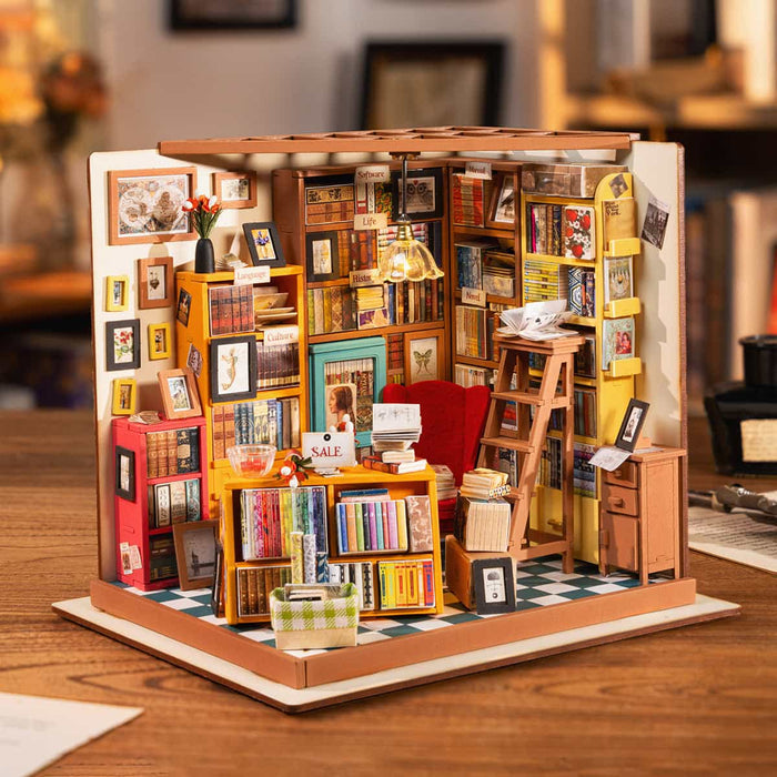 Rolife Sam's Study Library DG102 DIY miniature house with dimension annotations showing 7.4 by 7.08 by 8.5 inches against a white background